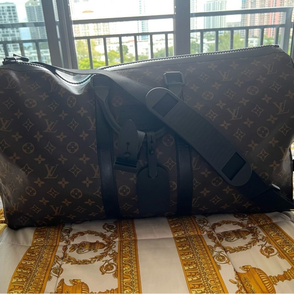 Louis Vuitton Brown Duffel Bag with Monogram Design